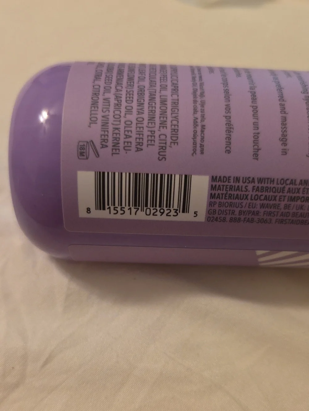 First Aid Beauty Lavender After-Shower Nourishing Body Oil - Purple Bottle